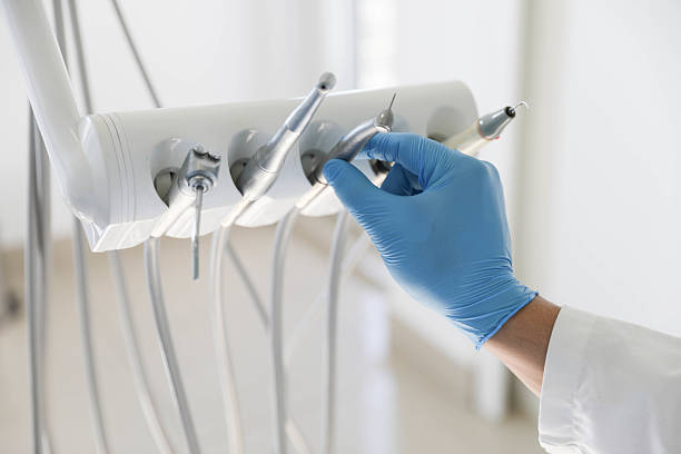 Professional Dental Implants technician working in Falls City, NE